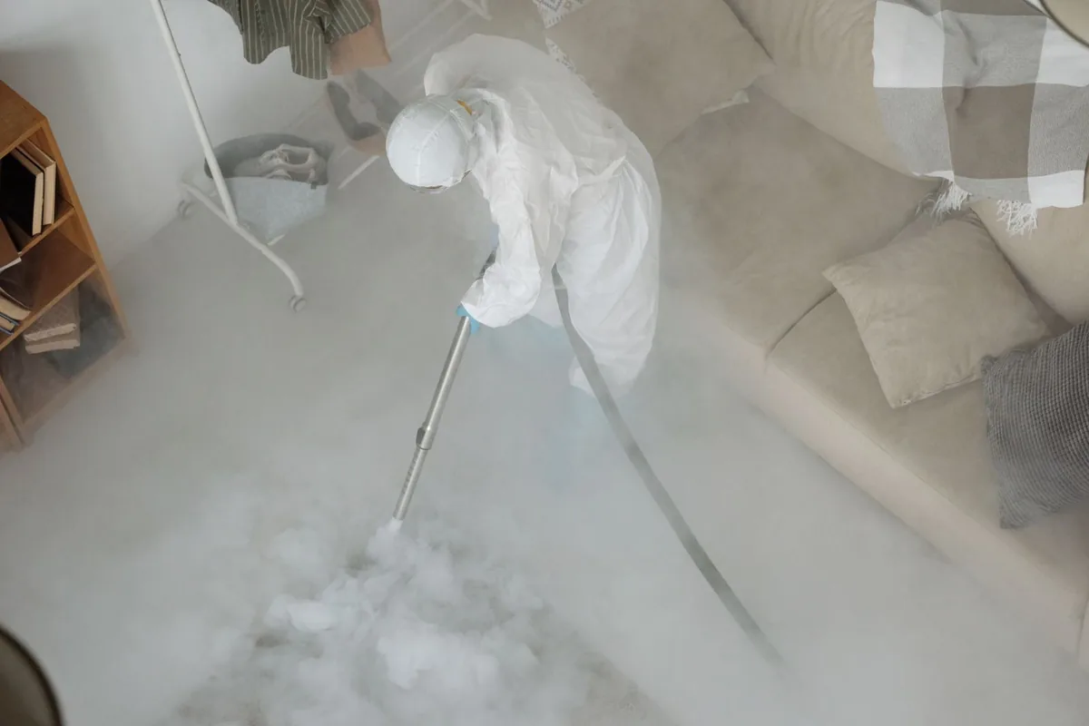 Biohazard cleanup technician in protective equipment, Munfordville, KY